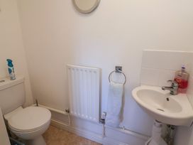 A bathroom with a toilet and sink at Morpeth in Combe St Nicholas