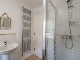 A bathroom with a shower and sink at Morpeth in Combe St Nicholas