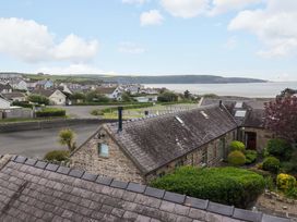 View of houses and coastline at No.8 Millmoor Farm Cottage in Broad Haven