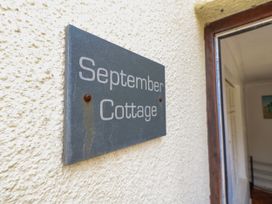 A sign reading September Cottage at 12 West Street, Weymouth