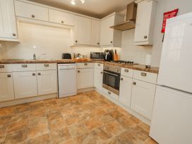 A kitchen with various appliances at 12 West Street Weymouth