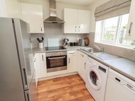 A kitchen with appliances and countertops at 26 Field Court 