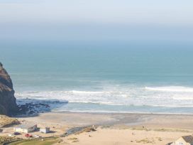 A view of the beach and ocean at Primrose Cottage in Redruth