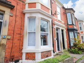 A front exterior view of a house with window and door at 17 Fairfield Road 