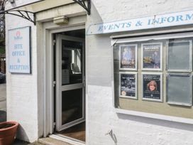 A site office entrance with event posters at Standard Caravan at Three Lochs Holiday Park Newton Stewart
