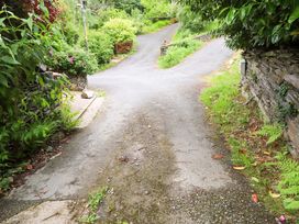 A pathway splitting into two directions at 2 Bryn Eglwys Prenteg