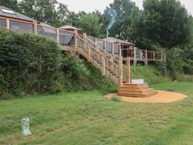 An outdoor area with stairs leading to a house at Copper Suite in Chulmleigh