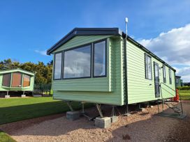 A mobile home with steps at St Andrews Holiday Park - Taigh na Mara in St Andrews