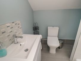 A bathroom featuring a sink and toilet at 5 Station Avenue
