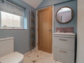 A bathroom with toilet and sink at 5 Station Avenue