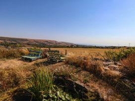 A view of a field with chairs at Dunvant in Swanage