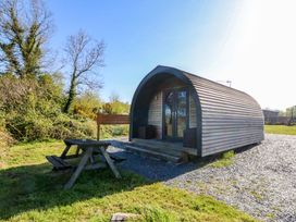 A pod with a picnic table at Bron Eifion Pod 3 Criccieth