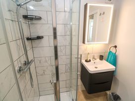 A bathroom with a shower and a sink at The Annex in Penzance