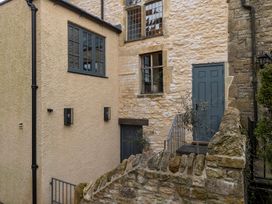 Exterior view of a house with stone wall and steps at Church Alley House Stow-On-The-Wold