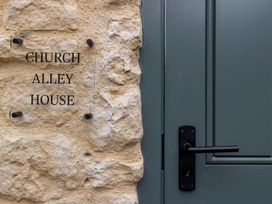 A door with a sign at Church Alley House Stow-On-The-Wold