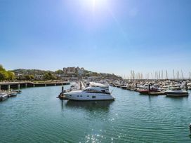 A marina with boats in the water at Hares Cottage in Torquay