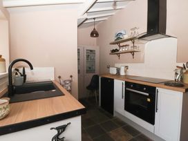 A kitchen with sink and countertop at The Cook’s Cottage in Malton