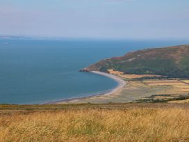 A beach coastline with hills and fields at Pete's Place in Taunton