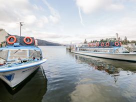 Boats on a lake at Lonsdale House in Bowness-On-Windermere