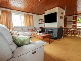 A living room with sofa and coffee table at 7 Chycoose Parc 