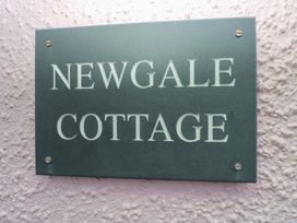 A sign displaying Newgale Cottage in Haverfordwest