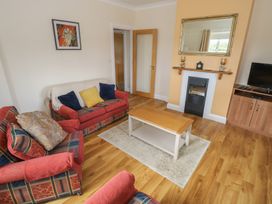 A living room with sofas and a coffee table at River House