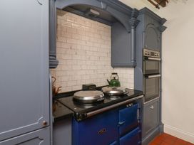 A kitchen with a stove and oven at Reighton House near Filey