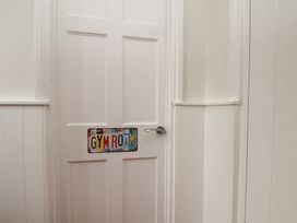 A door with a gym sign at Reighton House in Reighton near Filey