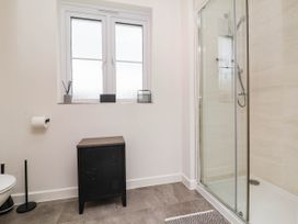 A bathroom featuring a shower and toilet at 24 Higher Gorse Road Roughton
