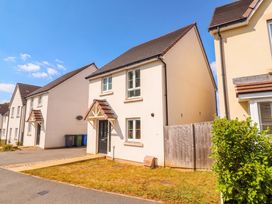 A house exterior with a driveway at 24 Higher Gorse Road in Roughton