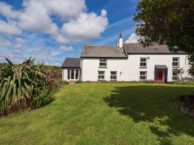 A house with garden and grass at Seveock in Threemilestone