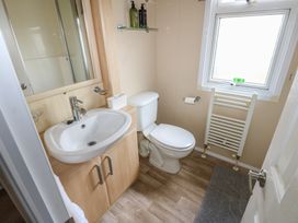 A bathroom with a sink and toilet at Plot 34 near Armathwaite