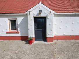 An entrance with a door and window at Gullane East in Rathmore, County Kerry