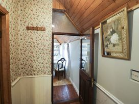 A hallway with a door leading to another room at Gullane East, Rathmore, County Kerry