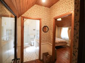 A hallway leading to a bathroom and bedroom at Gullane East in Rathmore, County Kerry