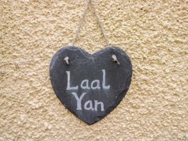 A slate heart sign with the text Laal Yan at La'al Yan Branthwaite