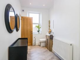 A bathroom with a sink and toilet at 24 Harrington Road Workington
