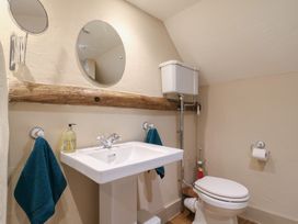 A bathroom with a sink and toilet at The Annex Cavendish Near Sudbury