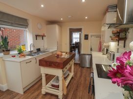 A kitchen with an island and sink at Memory Maker in Bridlington