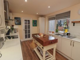 A kitchen with a central island and appliances at Memory Maker in Bridlington