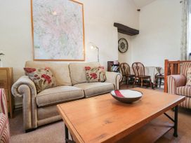 A living room with a sofa and coffee table at Rooftops in Lindale