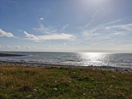 A view of the ocean and sky at Sea and Mountain view Sunbeach Holiday Snowdonia, Llwyngwril