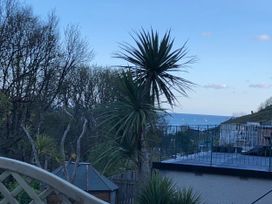 A view of the sea with boats and trees at 8Berth- SmartTV- CloseToBeach- FamilyFriendly in Millendreath near Looe