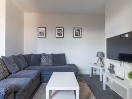 A living room with a sofa and a television at Lily Apartment - Sleeps 3 - Pet friendly - Parking in Bedlington