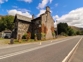 A stone building near a road at The School House in Penrith