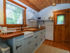A kitchen with a sink and countertop at Ardwyn in Pwllheli