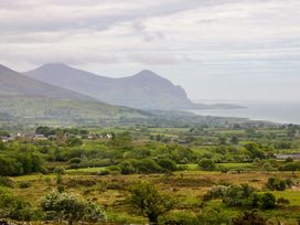 A landscape view of mountains and fields at Ty Loti 