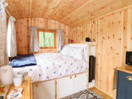 A bedroom with bed and window at Laurel in Welney near Littleport