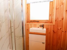 A bathroom with a shower and sink at Laurel near Littleport