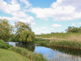 A river with trees and grass alongside at Laurel in Littleport
